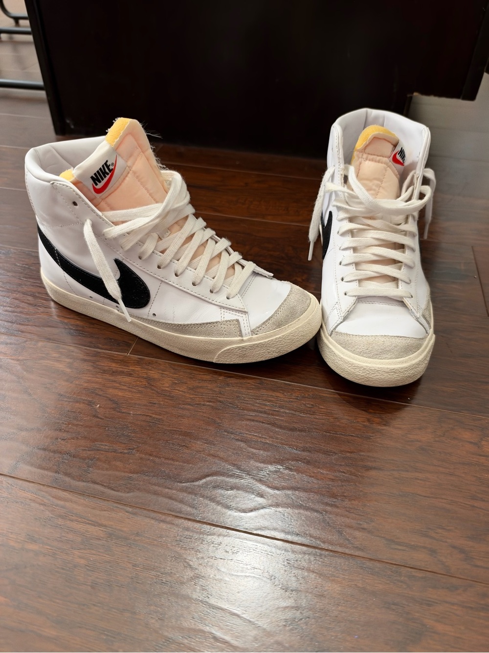 Nike unisex White High-Top Sneakers with Black Swoosh and Cream Accents